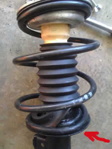 Are there any tricks for using cheap spring compressor on E46 BMW?